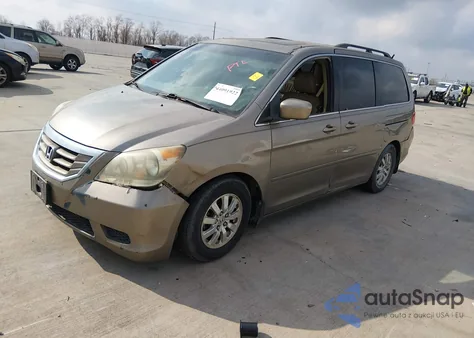 2010 Honda Odyssey Ex-L z USA, uszkodzony, nr VIN 5FNRL3H79AB090849
